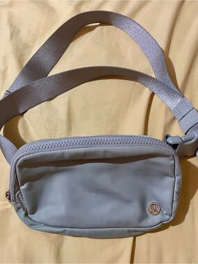 Lululemon Women's Everyday Belt Bag - Colorway is Silver Drop.